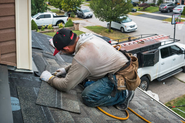 Professional Roof Replacement technician working in Portage, WI